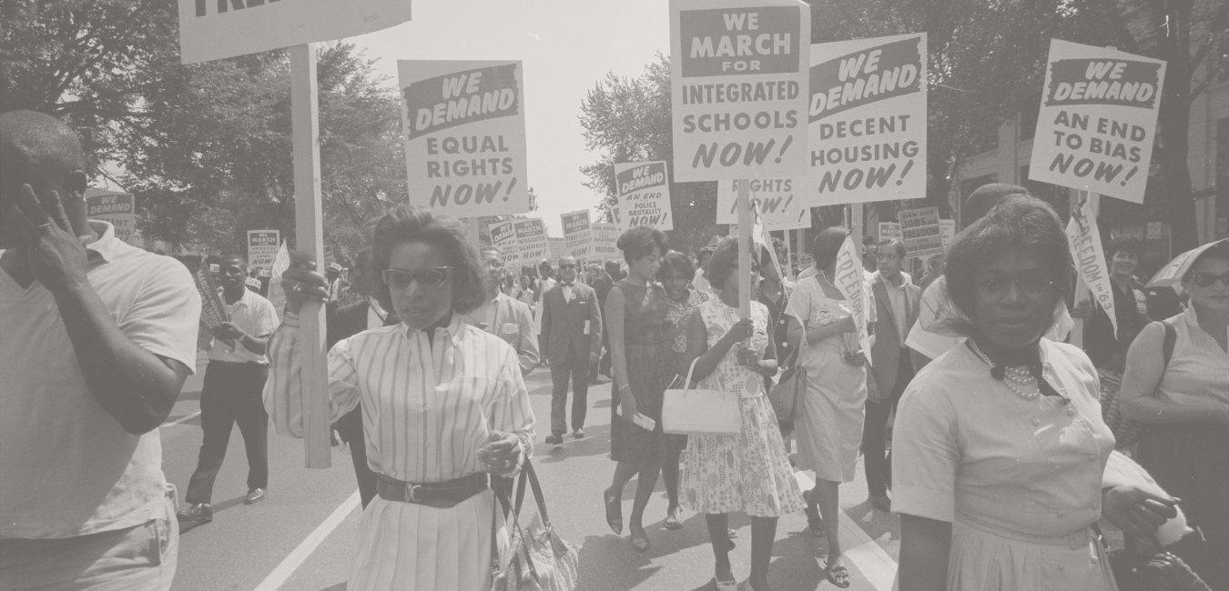 A historical photo showing black women protesting for equal rights and healthcare