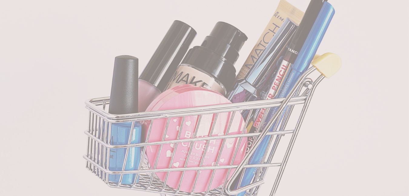 A mini shopping trolley full of makeup essentials
